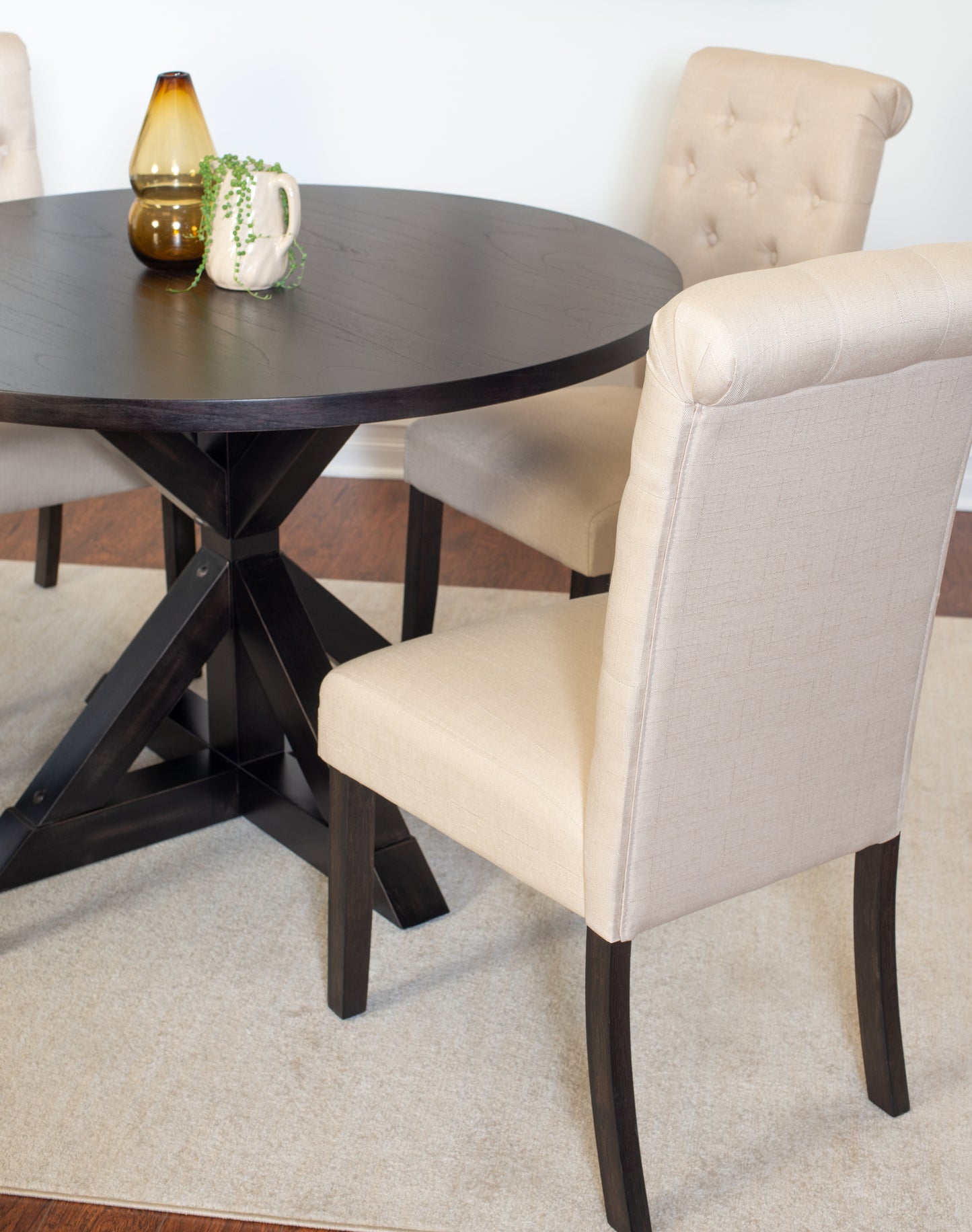 Round Cross Buck Dining Table With Four Modern Chairs Set