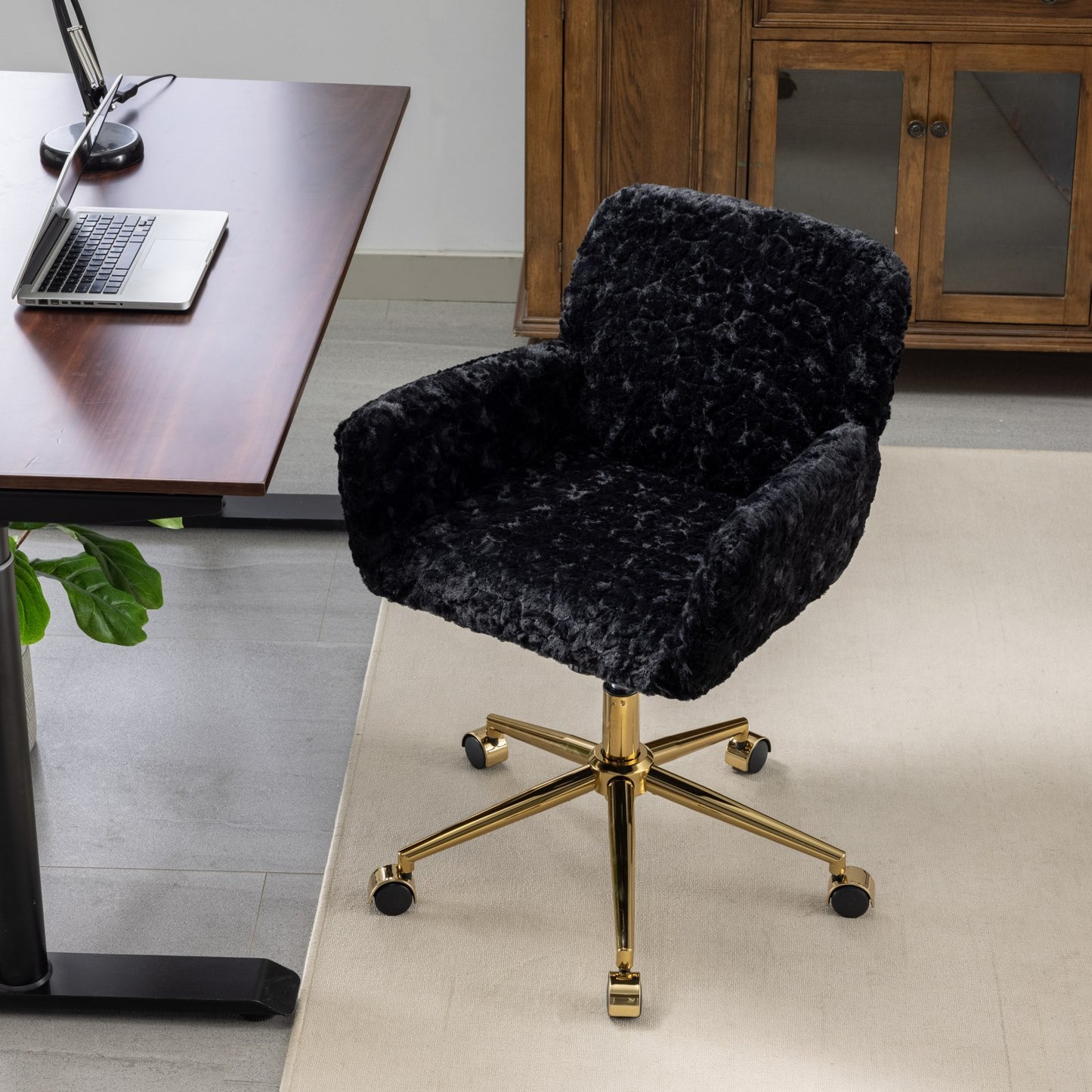 Elegant Black Upholstered Office Chair with Golden Metal Base, Adjustable Swivel Design, Ideal for Home and Vanity Use
